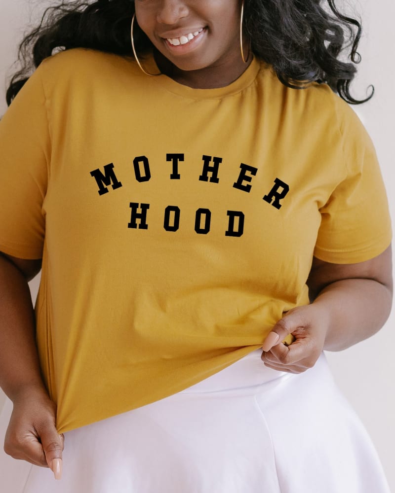 Front of a model wearing a size 2XL Motherhood in Mustard by Simply Sage Market. | dia_product_style_image_id:281565